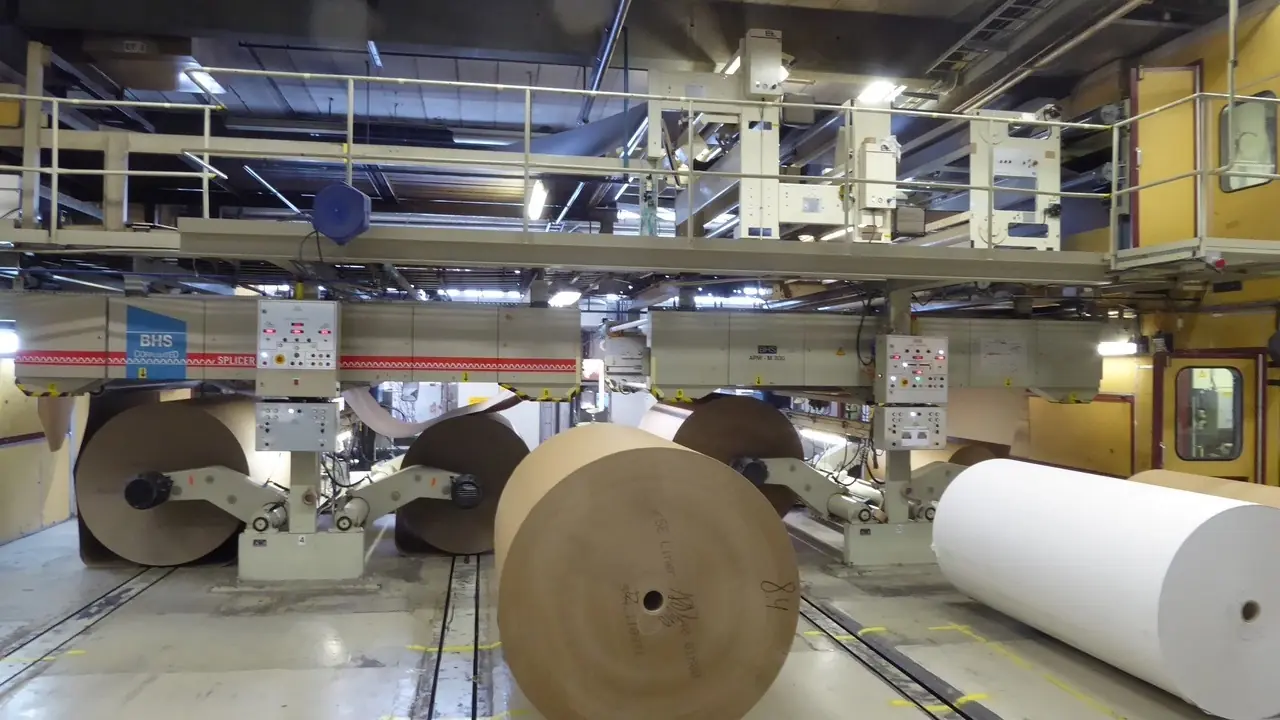 Paper reels and the corrugator in QVC's production hall